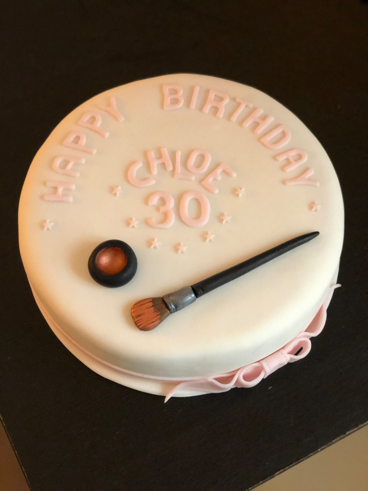 30th birthday cake with cream fondant decorated with an artist’s palette and brush