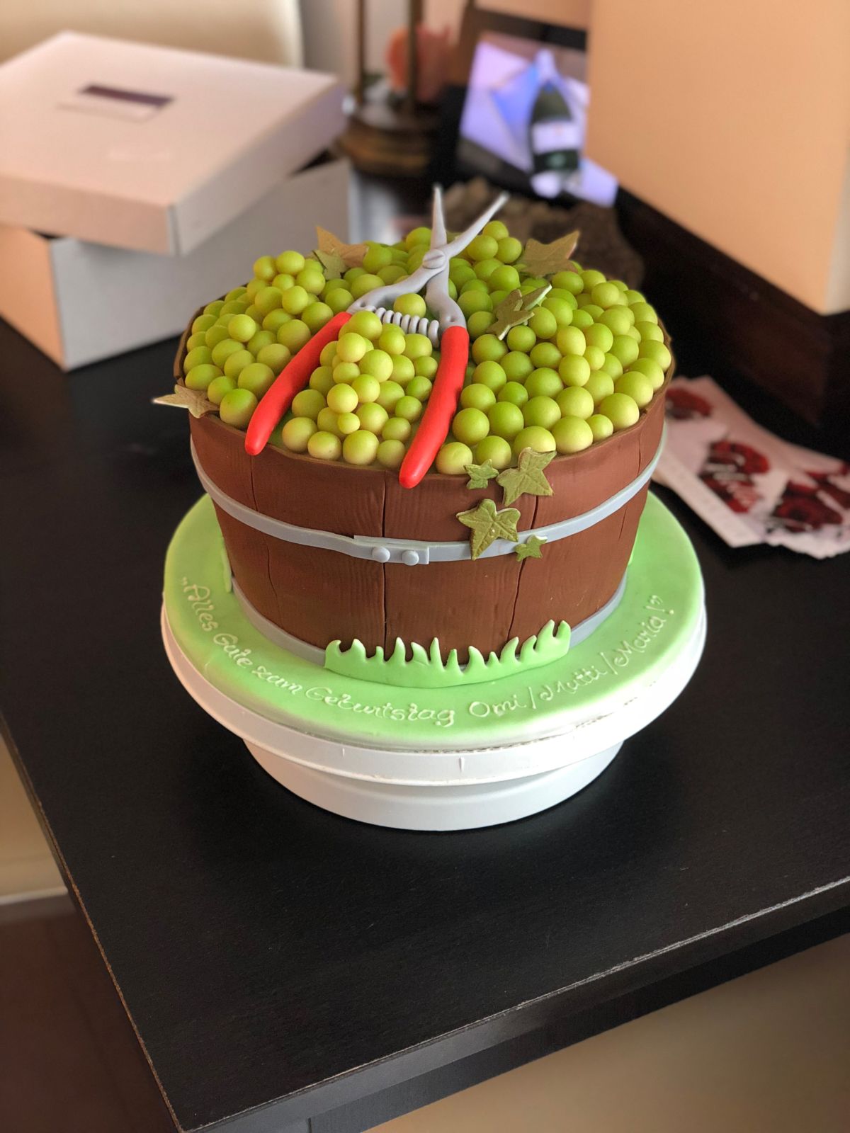 Harvest basket cake overflowing with green fondant grapes