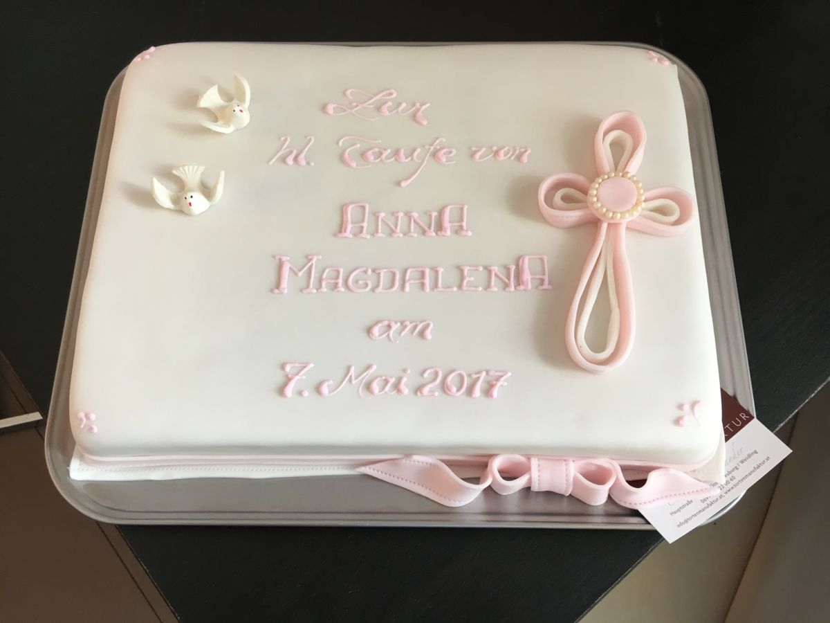 Rectangular christening cake with pink cross and white dove motifs